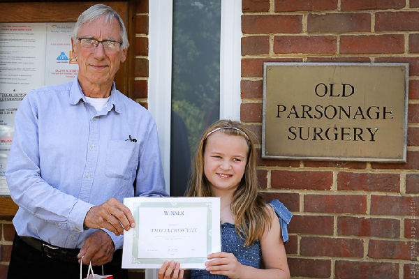 Colin Samuell presenting Amelia Cresswell with a certificate